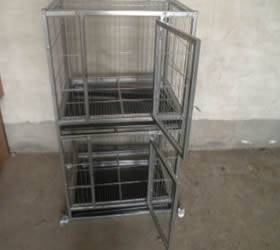 Pet cage with stainless steel frame.